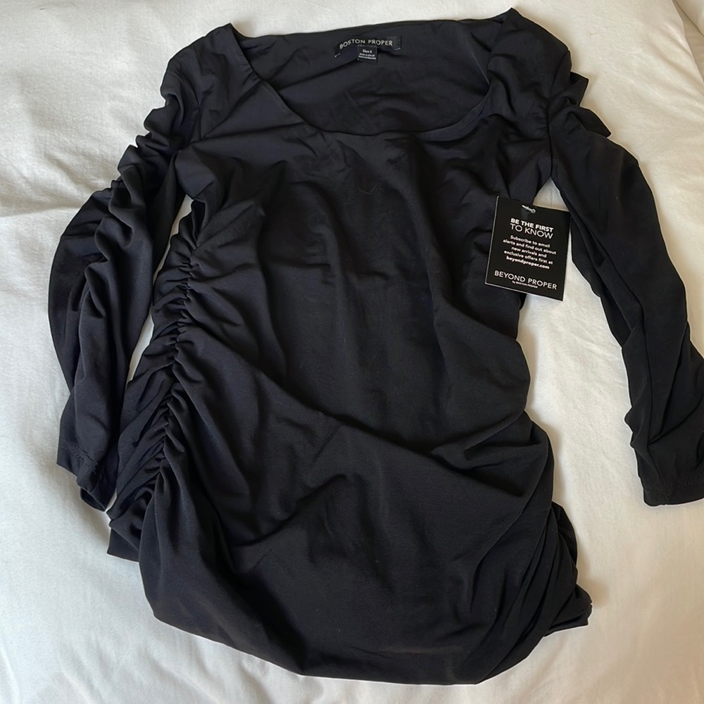 Women's small ruched sleeve and sided top